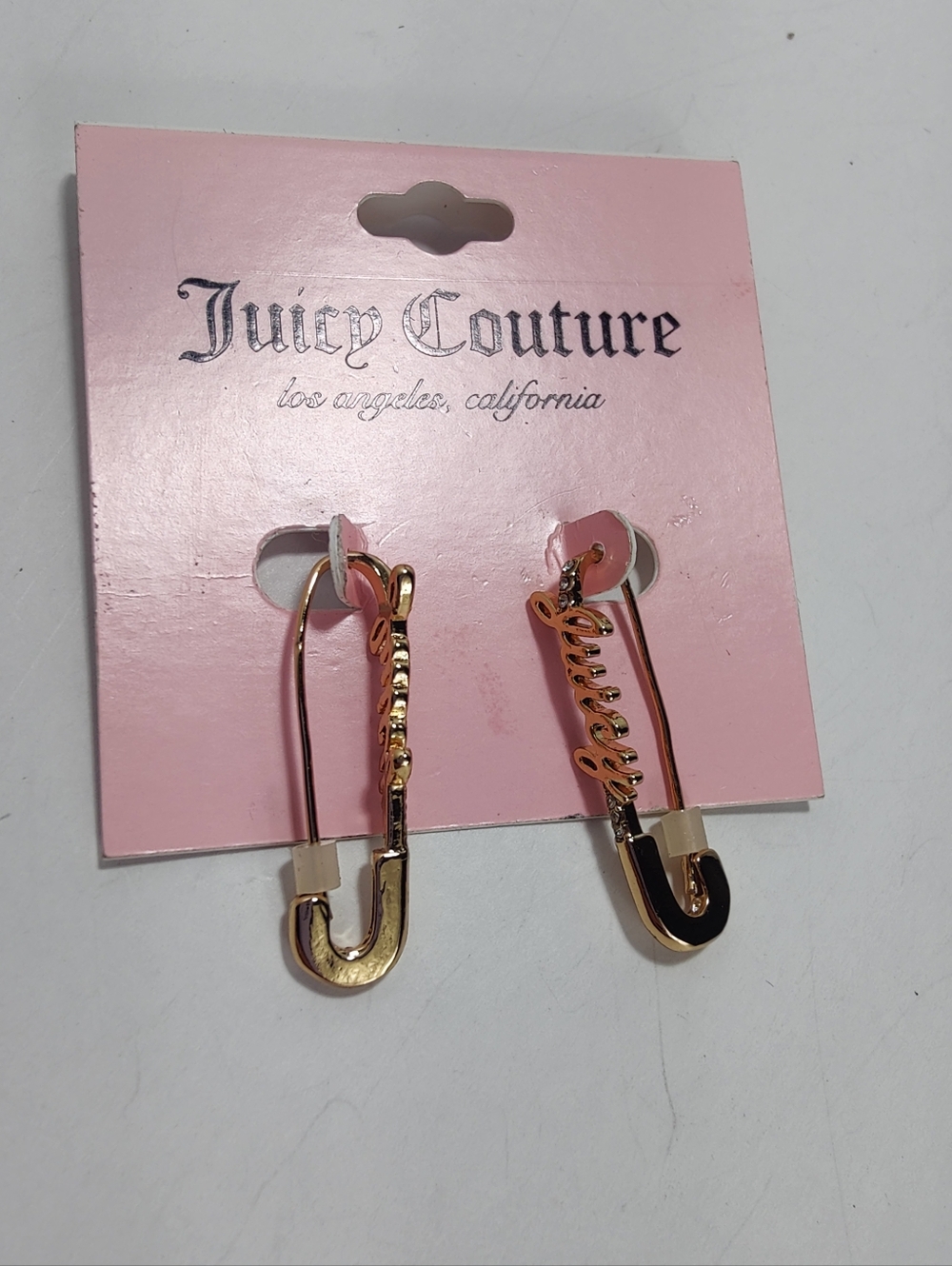 Juicy Couture Gold Tone “Juicy” Safety Pin Earrings Rhinestone Logo Dangle New - Picture 4 of 7